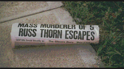 A newspaper headline reads Mass Murderer of 5 Russ Thorn Escapes, in a still from The Slumber Party Massacre.